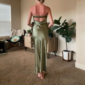 Sage green midi dress. Strapless with an open back. Satin material.